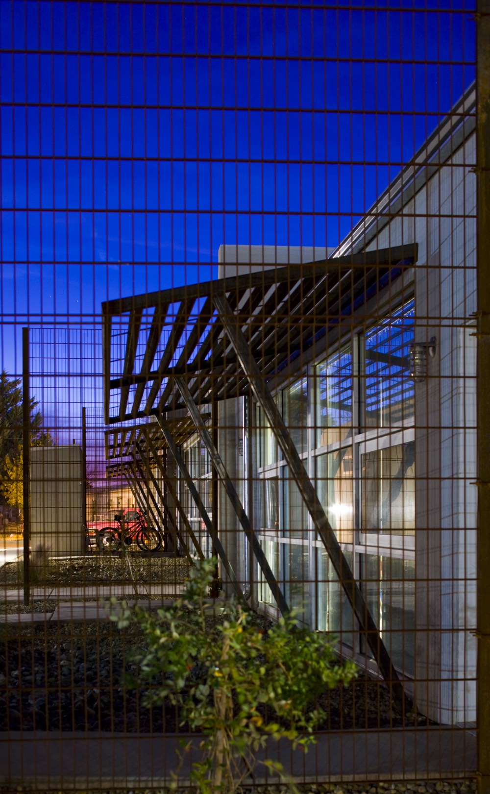 Deep blue sunset sky over Lo Lomas seen through the steel entry screens, Clovis New Mexico